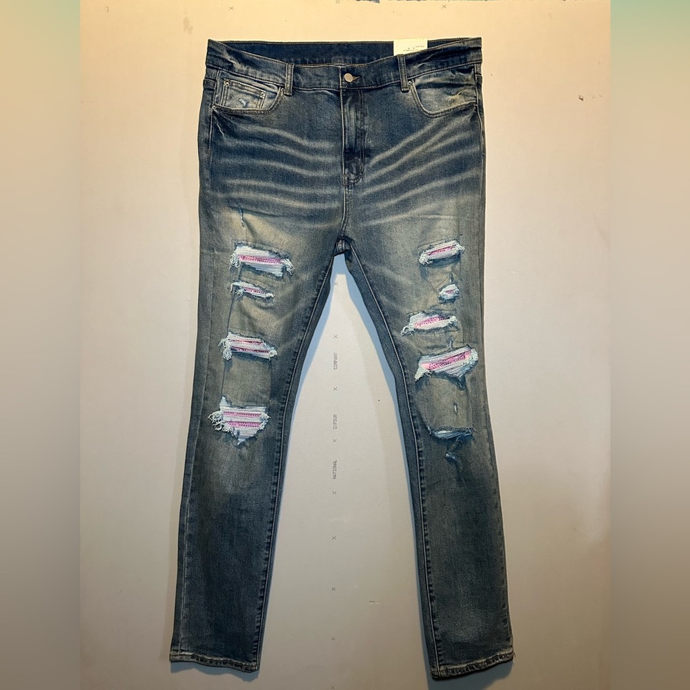 Denim jeans with pink rhinestones